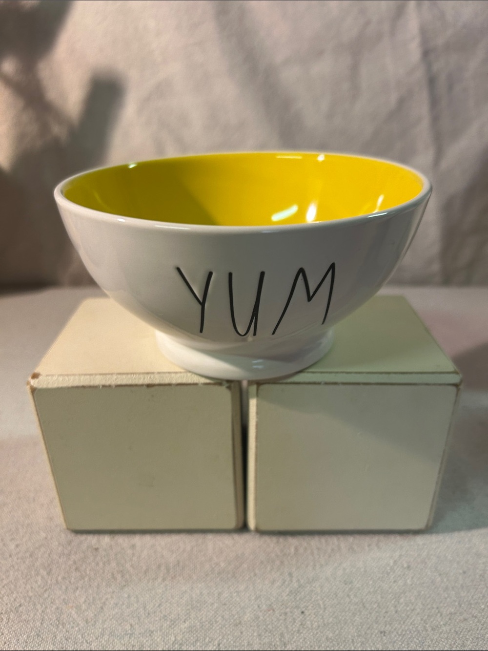 Rae Dunn White Ceramic Bowl with Yellow Interior - YUM